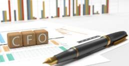 Accounting Services in Brunswick, Maine - CFO and pen on desk